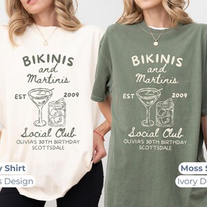 May include: Two t-shirts, one ivory and one moss green, each with a graphic that reads "Bikinis and Martinis" above a martini glass and a cocktail. The text "Social Club" and "Olivia's 30th Birthday Scottsdale" are also printed.