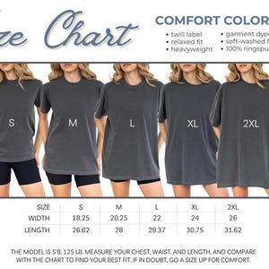 A size chart showing a model wearing a dark gray t-shirt in five different sizes from S to 2XL, alongside width and length measurements.