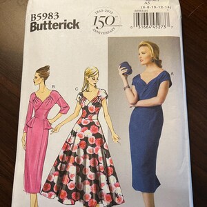 May include: A sewing pattern for three dresses. The pattern is for sizes 6-8-10-12-14. The dresses are all different styles. One is a pink dress with a fitted bodice and a full skirt. Another is a floral print dress with a fitted bodice and a full skirt. The third is a blue dress with a fitted bodice and a straight skirt.