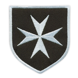 May include: Embroidered patch with a white Maltese cross on a dark brown shield. The cross, with eight points, is stitched in white. The patch has a white border. Ideal for jackets, bags, or other fabric items.