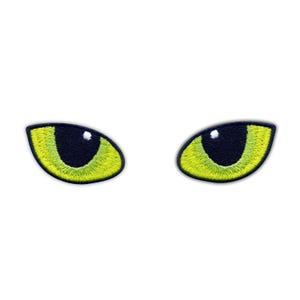 May include: Embroidered patches depicting a pair of cat eyes. Each eye has a black pupil and a vibrant yellow-green iris, with a black thread outline. These patches are suitable for sewing or ironing onto various fabrics.