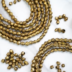 Brass Bicone Beads: African Brass Beads in a Bicone Shape, 7 to 10mm beads, 60 + beads Full Strand, African Metal Beads, Jewelry Supplies