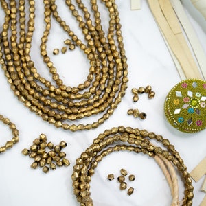 Brass Bicone Beads: African Brass Beads in a Bicone Shape, 7 to 10mm beads, 60 + beads Full Strand, African Metal Beads, Jewelry Supplies