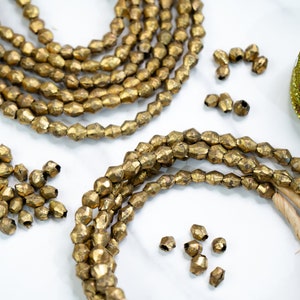Brass Bicone Beads: African Brass Beads in a Bicone Shape, 7 to 10mm beads, 60 + beads Full Strand, African Metal Beads, Trade Beads, Jewelry Making Supplies