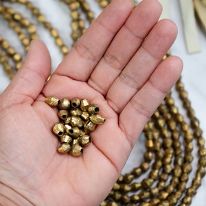 Brass Bicone Beads: African Brass Beads in a Bicone Shape, 7 to 10mm beads, 60 + beads Full Strand, African Metal Beads, Jewelry Supplies