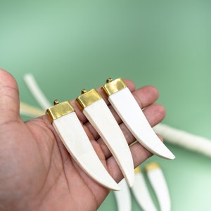 Horn Bone Tusk Pendant: Cream White Ethically Buffalo Bone Tusk Pendant with Gold Toned Brass Cap, 20x83mm, Teeth, Tusk, Lightweight Pendant, Jewelry Supplies