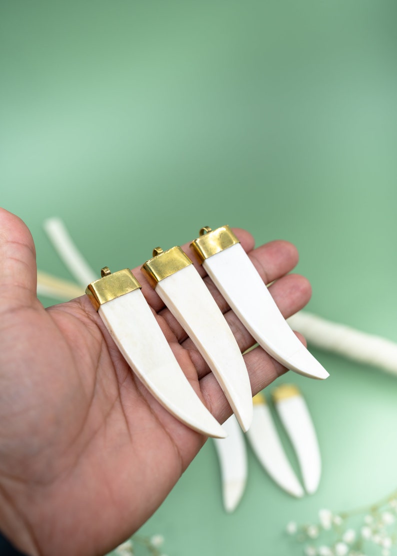 Horn Bone Tusk Pendant: Cream White Ethically Buffalo Bone Tusk Pendant with Gold Toned Brass Cap, 20x83mm, Teeth, Tusk, Lightweight Pendant, Jewelry Supplies