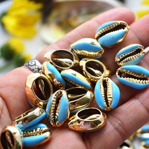 Sky Blue Enamel Cowrie Shell – 1 shell, Gold-Plated Shell Charm for Beach Jewelry and Crafts | Shell Jewelry, Plated Shells, Cowry Shells