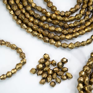 Brass Bicone Beads: African Brass Beads in a Bicone Shape, 7 to 10mm beads, 60 + beads Full Strand, African Metal Beads, Trade Beads, Jewelry Making Supplies
