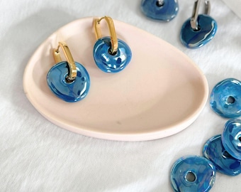 Oval or round earrings with blue ceramic tassels, interchangeable rings, sleek jewelry for women in stainless steel