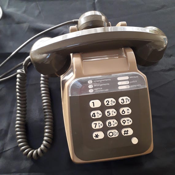 Téléphone vintage orange jaune socotel s63 - Décoration