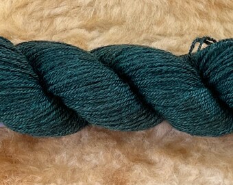 Merino X Romney Lamb.  Hand Spun and Hand Dyed. 3.5oz. 200yds.  Evergreen