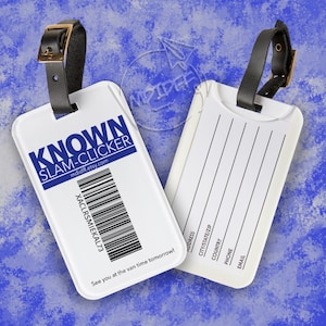 May include: White luggage tag with a black strap and a blue and white design. The tag says "Known Slam-Clicker" and has a barcode and the text "mdidff.etsy.com". The tag also has the text "See you at the van time tomorrow!" and a blank space for writing an address, city, state, zip code, country, phone number, and email address.