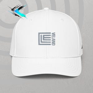 May include: White baseball cap with a gray embroidered logo that says "VELAND" and a stylized geometric design.
