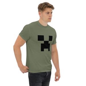 Minecroft Creeper Face Unisex T-shirt. Military Green, White, Red. Note: This is not an official product.
