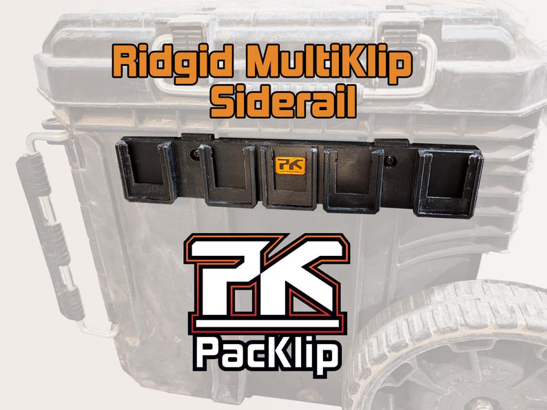 May include: A black Ridgid MultiKlip Siderail tool organiser for a toolbox. The organiser has five slots and is labelled with the PackKlip logo.