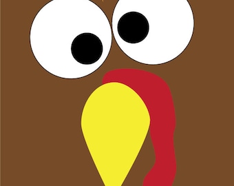 May include: A brown turkey face with large white eyes, black pupils, and a yellow beak with a red wattle.