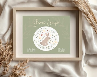 May include: A green and white baby announcement print with a floral wreath and a bunny rabbit. The print includes the name "Jamie Louise", the birth date "October 25, 2024", and the baby's weight and length: "8 lbs 3 oz, 21 inches".