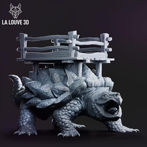 May include: A grey, 3D-printed fantasy figurine of a large turtle with a wooden cart on its back. The turtle has an open mouth and detailed scales. The cart has a fence-like design. The logo "LA LOUVE 3D" is in the top left corner.