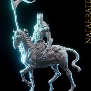 May include: A detailed, white sculpture of a skeletal figure riding a skeletal horse, holding a staff with a banner. The figure wears a crown. The sculpture is set against a black background.