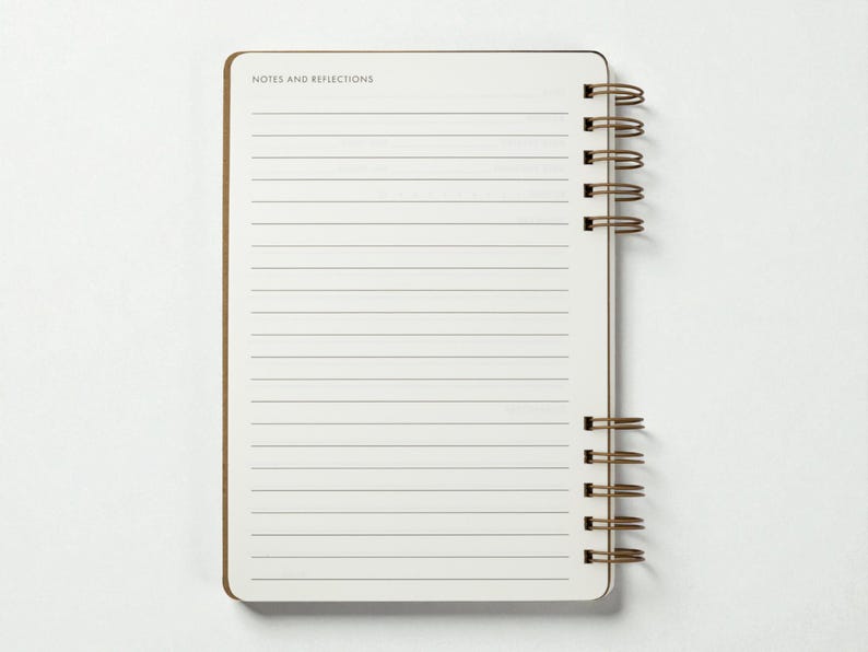 Interior notes page of the reading journal labeled “Notes and Reflections,” featuring full-page lined space for writing. Journal is photographed open with the wire binding visible on the right side against a clean white background.