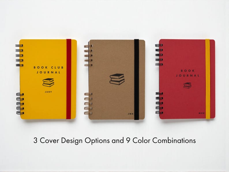 Three Little Bespokebooks Reading Journals displayed side by side showing 3 cover designs and 9 color combinations. Includes citrine with red band, kraft with black band, and vermilion with yellow band. Each personalized with name or initials on the cover. Handmade in Charlottesville, Virginia.