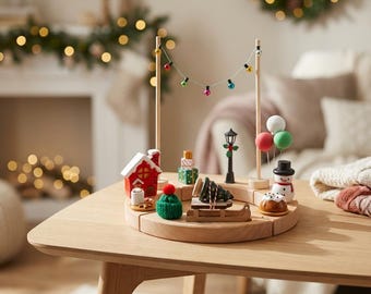 May include: A wooden Christmas village scene with miniature houses, a snowman, a Christmas tree, and a string of colorful lights. The scene is set on a wooden table, with a cozy, festive atmosphere.