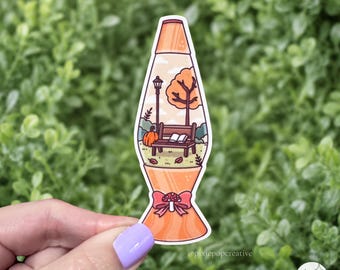 Autocollant lampe à lave d'automne : Scène de parc littéraire avec citrouille et champignon