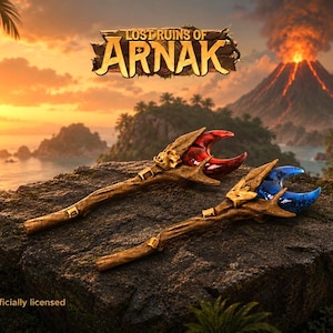 May include: Two replica staffs from the board game Lost Ruins of Arnak, one featuring a translucent red crescent top and the other a translucent blue crescent top, both with textured brown wooden-look handles and gold-colored metal accents.