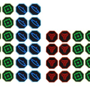 May include: A collection of octagonal stickers arranged in two groups. The stickers feature three distinct designs in red, green, and blue, each with a matching colored border. The designs include a central geometric shape, a circular pattern, and a ring.