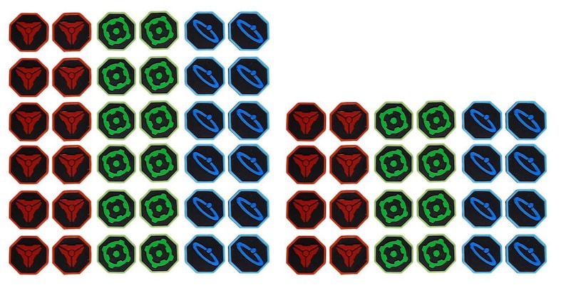 May include: A collection of octagonal stickers arranged in two groups. The stickers feature three distinct designs in red, green, and blue, each with a matching colored border. The designs include a central geometric shape, a circular pattern, and a ring.