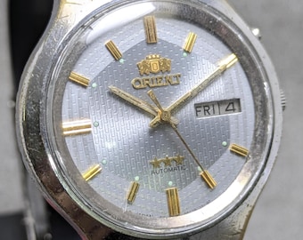 Reloj de hombre Orient automático vintage con fecha y día, esfera gris, movimiento n.° 48320A, fabricado en Japón, envío gratuito.