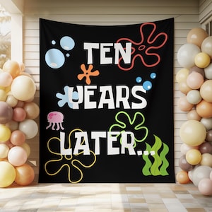 May include: Black banner with the text "TEN YEARS LATER..." in white, with colorful cartoon accents. The banner is decorated with bubbles, starfish, and seaweed. Balloons in shades of beige, peach, and brown are on either side.