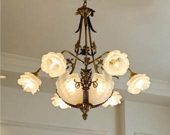 Vintage-Inspired Floral Chandelier: Ornate Bronze Pendant Light with Frosted Glass