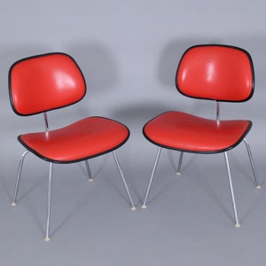 Pair of Herman Miller DCM Charles Eames Dining Chairs red Naugahyde Chrome Base vintage mid century modern