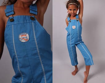 kids overalls bibs 1980s Jungle Patrol Buster Brown romper blue pants unisex girl boy childs vintage