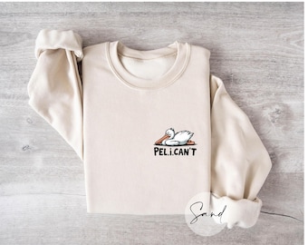 Funny "PeliCAN'T" Pelican Sweatshirt - Cute Bird Pun Shirt - Witty Coastal Gift - Lazy Day Aesthetic - Minimalist Animal Graphic