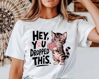 Camiseta divertida con gato: camiseta con gráfico de gatito "Oye, se te cayó esto", linda camiseta para amantes de los gatos, regalo de humor sarcástico para el cerebro, regalo para dueños de mascotas