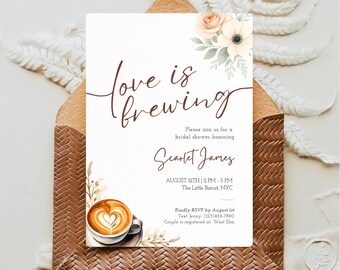 May include: A rectangular bridal shower invitation card featuring the text "love is brewing" in brown script, a watercolor illustration of a coffee cup with heart latte art, and peach floral accents. The card includes event details for Scarlet James.