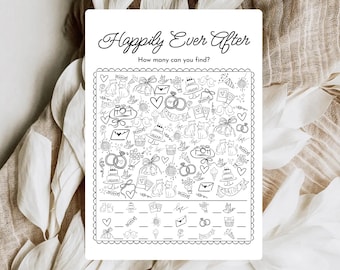 May include: A black and white wedding-themed activity sheet with the words "Happily Ever After" at the top. The sheet features a detailed doodle design with hearts, rings, cakes, and other wedding-related illustrations. The bottom has fill-in-the-blank sections.