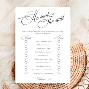 Puede incluir: Una tarjeta de juego de boda rectangular blanca con el t&iacute;tulo He said She said en letra cursiva negra. La tarjeta presenta una lista de diez afirmaciones con casillas de verificaci&oacute;n en forma de coraz&oacute;n para las columnas novia y novio.
