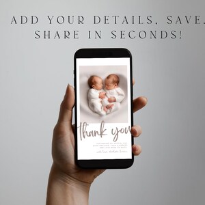 May include: A smartphone displays a newborn baby announcement. The image on the phone shows two babies in white onesies. The words "thank you" are written in cursive below the babies. The top of the phone reads "ADD YOUR DETAILS. SAVE. SHARE IN SECONDS!"
