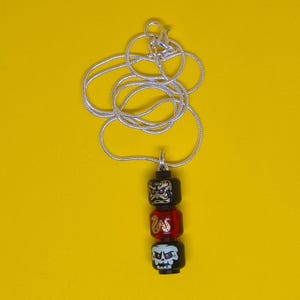 Handmade Year of snake monster head pendant