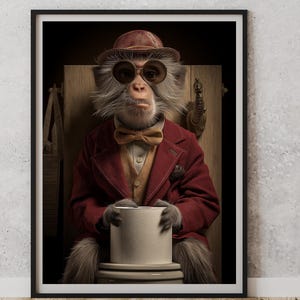 May include: A framed print featuring a monkey dressed in a red blazer, brown hat, and round glasses. The monkey is holding a white cylinder and seated in a vintage setting. The artwork has a whimsical, anthropomorphic theme.
