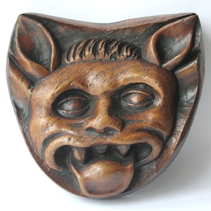 Gotisk demonreproduktion, medeltida katedral, Misericord-snidning, mytisk varelse, gåva.