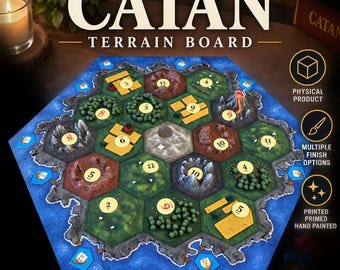 May include: A Catan terrain board game set featuring a hexagonal map with textured tiles representing mountains, forests, fields, and hills. The board includes numbered circular tokens, blue water borders, and small game pieces on a dark surface.