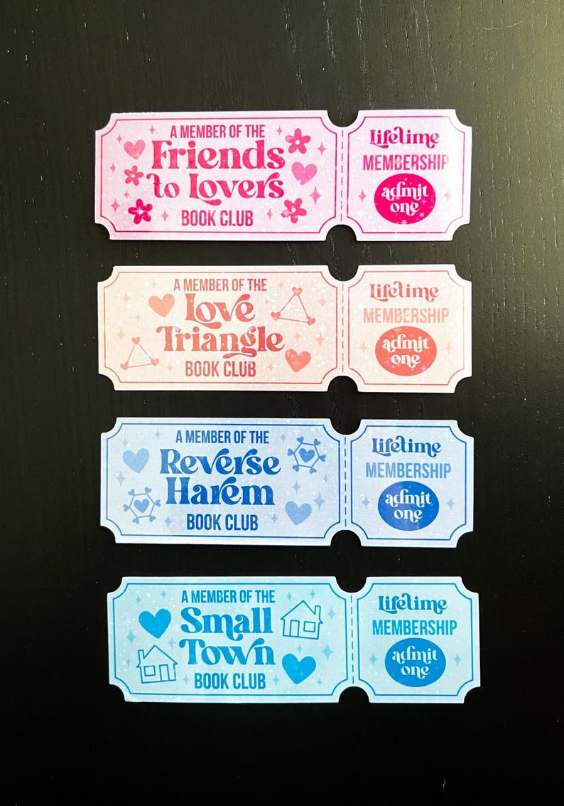May include: Four colourful book club membership tickets. Each ticket features a different theme: Friends to Lovers, Love Triangle, Reverse Harem, and Small Town. Each ticket includes the text "lifetime membership" and "admit one".