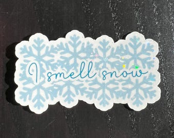 I Smell Snow Sticker | Holographic Winter Sticker | Lorelai Inspired Vinyl Decal | Cute Snow Decor for Winter Enthusiasts | Laptop Sticker