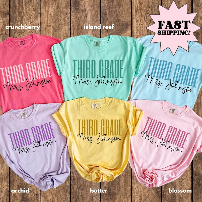 Personalized third grade teacher t-shirts in multiple colors featuring text “Third Grade Mrs. Johnson.” Custom teacher name shirts in crunchberry, island reef, light blue, orchid, butter yellow, and blossom pink. Back-to-school teacher apparel, personalized grade level shirt, Comfort Colors unisex t-shirt, elementary school teacher gift, custom classroom tee