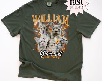 May include: Moss green t-shirt featuring a graphic of six French Bulldogs with the name "WILLIAM" in orange and white lettering. The phrase "Your text" is below the dogs. A "fast shipping" graphic is in the upper right.